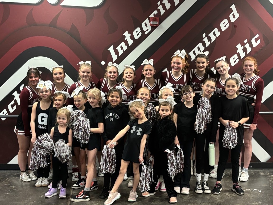Picture of the mini & Jr Cheer Camp participants with the Demons Cheerleading team