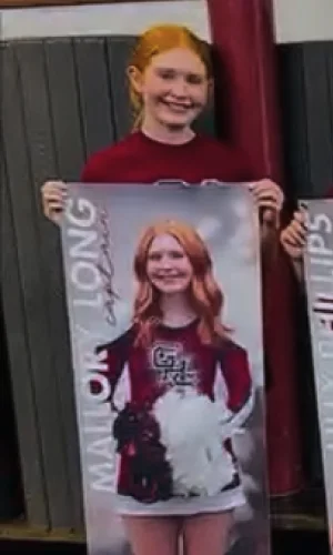 Senior Cheerleaders present their banners